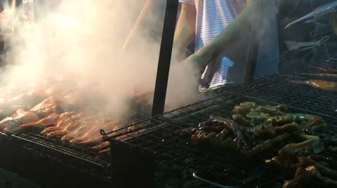 Thai style Street food grilled chicken or BBQ with charcoal ,Thailand Stockbeeldmateriaal 64144192