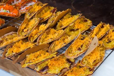 Thai style stuffed crispy stuffed with sweet coconut and Thai sweet golden th Stock Photos