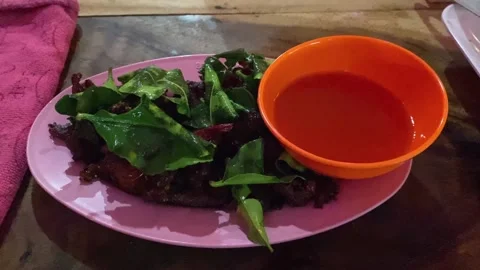 Thai Sun Dried Beef (Jerky) With Kaffir Lime Leaf &amp; Dipping Sauce, Street Food Stock Footage 233656367