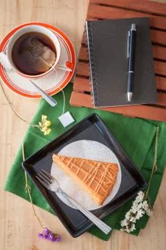 Thai tea cake with notepad Stock Photos