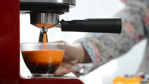 Thai tea pouring from coffee machine. Stock Footage 141185187