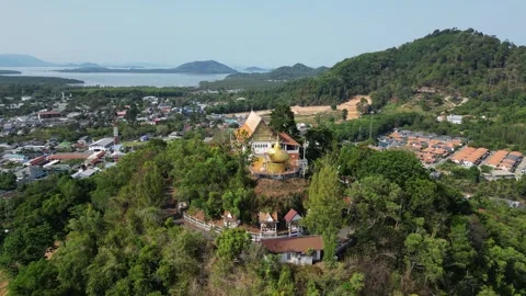 Thai temple on a hill overlooking the sea bay. Drone video Stock-Footage 300099063