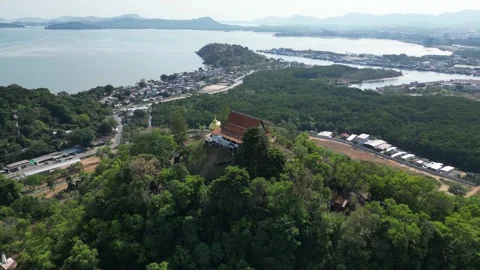 Thai temple on a hill overlooking the sea bay. Drone video Stock Footage 300099249