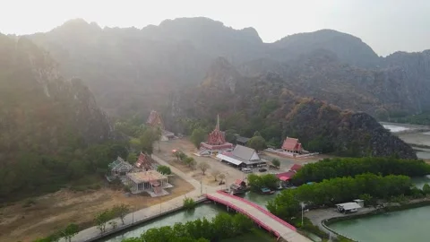 Thai temple in the middle of the valley Stock Footage 249301951
