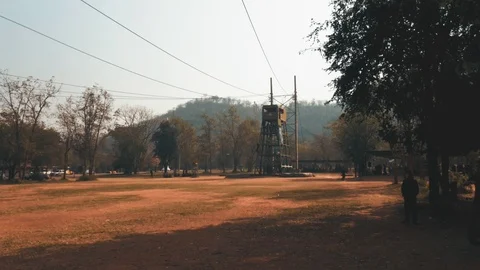 Thai Territorial Students jumping off a tower with the height of 54 feet Stock Footage 100640005