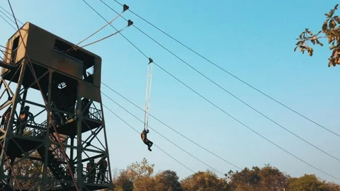 Thai Territorial Students jumping off a tower with the height of 54 feet  Stock-Footage 100640449