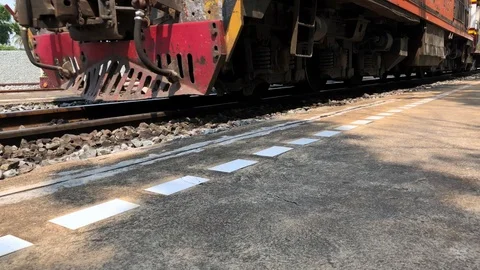 Thai train arrives at the train station. Stock Footage 105984121