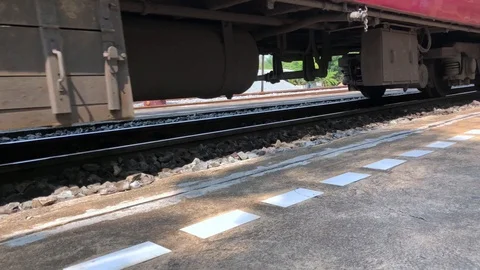 Thai train arrives at the train station. Stock Footage 105984466