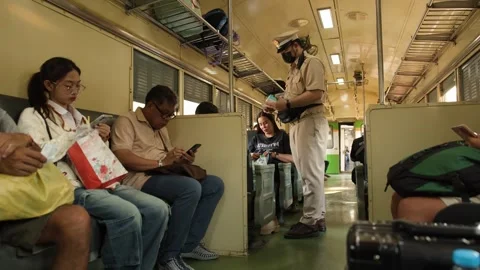 Thai Train Conductor Checking Tickets of Passengers Video stock 328068677