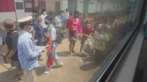 Thai train passengers are getting on the train at train station in Chiang Mai Stock Footage 240369536