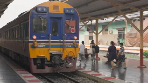 Thai train passengers are getting on the train at train station in Chiang Mai Stock Footage 240369657