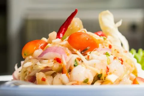 Thai treaditional food, squid eggs spicy salad Stock Photos