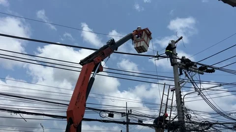 Thai Utility Workers Repairing Tangled Power Lines Stock Footage 331513121