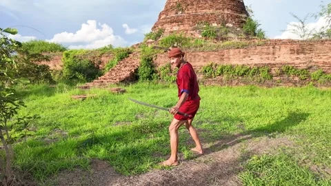 Thai Warrior Practicing Ancient Martial Arts at Ayutthaya Temple Ruins Stock Footage 344724859