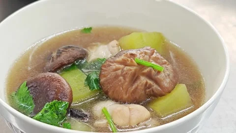 Thai winter melon soup with chicken and shiitake mushrooms. Stock Footage 342027346