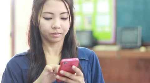 Thai woman using mobile Stock Footage 42326233