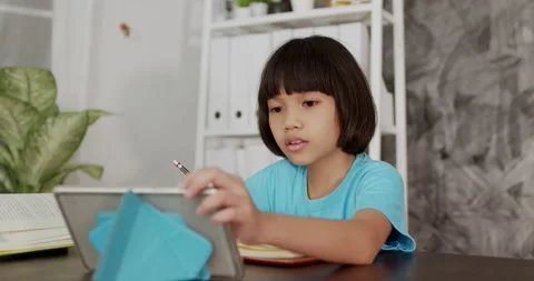 Thai young kid learning online at home Video stock 138929689