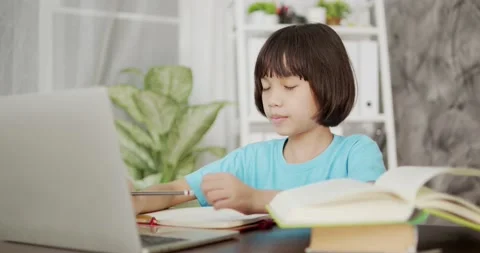 Thai young kid learning online at home Stock Footage 139956486