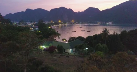 Thailand 4K drone Phi Phi Island dawn party. Stock Footage 114321706
