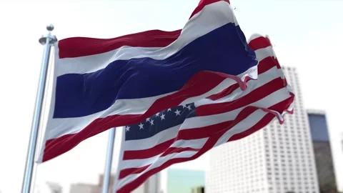 Thailand and United States Flags Waving on Flagpoles. Seamless Stock Footage 297385553