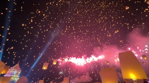 Thailand: Breathtaking View As Sky Lanterns Ignite Night Sky In Chiang Ma... Stock Footage 320799995