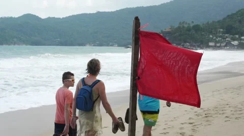 THAILAND, CIRCA 2015: Red warning flag, swimming is prohibited Stock Footage 63178364