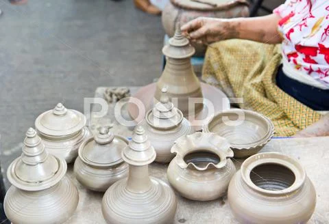 Thailand craftsman working on pottery clay and crafts Stock Photos