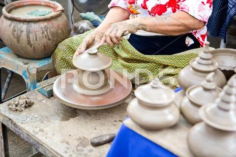 Thailand craftsman working on pottery clay and crafts Stock Photos