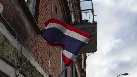 Thailand flag waving in the wind outside of a thai restaurant. Stock Footage 301677107