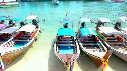 THAILAND, PHI PHI ISLANDS Exotic view of a long tail boata on the coast of Phi Video stock 147454053