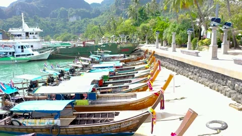 THAILAND, PHI PHI ISLANDS Exotic view of a long tail boata on the coast of Phi Vídeo Stock 147454144
