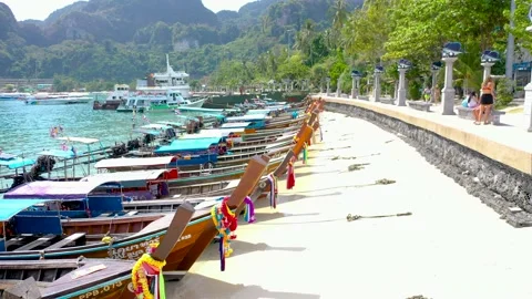 THAILAND, PHI PHI ISLANDS Exotic view of a long tail boata on the coast of Phi 스톡 동영상 147454360
