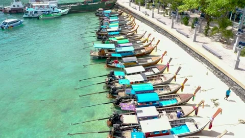 THAILAND, PHI PHI ISLANDS Exotic view of a long tail boata on the coast of Phi Video stock 147454481