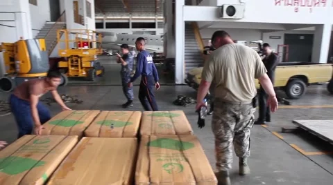 Thailand, US Air Force  US Soldier Volunteers Load Supply For Air Drop Stock Footage 56201213