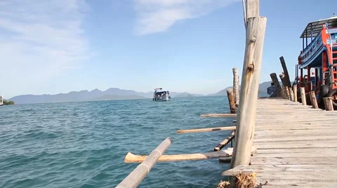 Thailnad boat docking in the pier Stock Footage 58748557