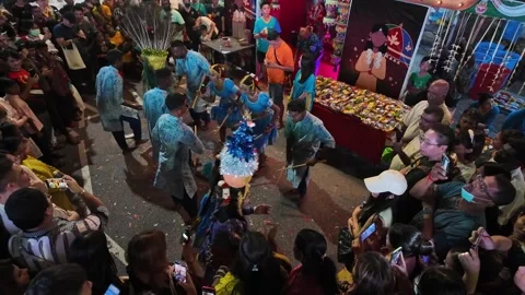 Thaipusam devotees engage in stick dance as an expression of joy and devotion. Stock Footage 318265480