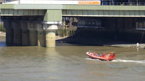 Thames Rockets high-speed rigid inflatable boat navigating the River Thames Video stock 321460462