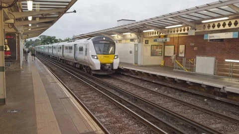 ThamesLink Train arriving at Peckham Rye Station, early morning. Stock Footage 284490177