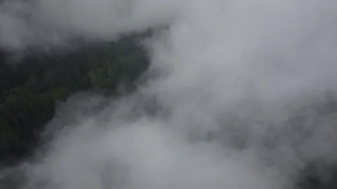 Thandyani Top view of mountain covered with fog and clouds drone shot Vidéo 237445896