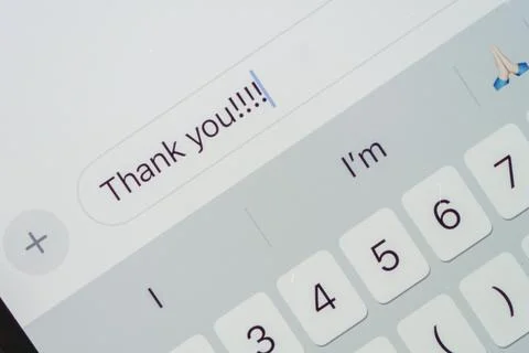 A thank you message on a mobile device Stock Photos