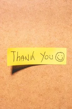 A Thank you note on a brown background Stock Photos