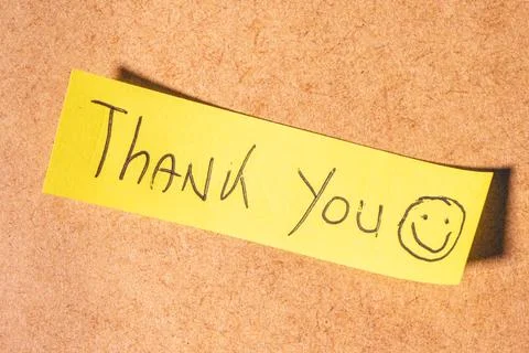 A Thank you note on a brown background Stock Photos