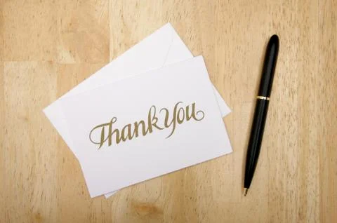 Thank You Note Card and Pen on Wood Background. Stock Photos