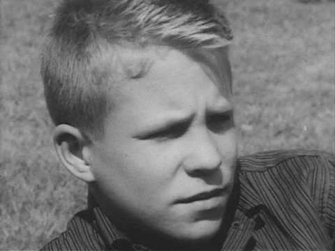Thanks to television, a boy has seen the SS Andrea Doria sinking, an Emmy Award, Stock Footage 74968029