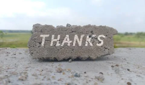 Thanks written on the wall. Stock Photos