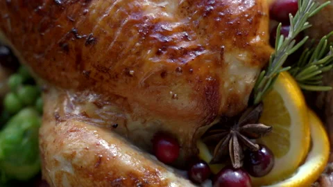Thanksgiving chicken background. Baked chicken or turkey garnished with Stock Footage