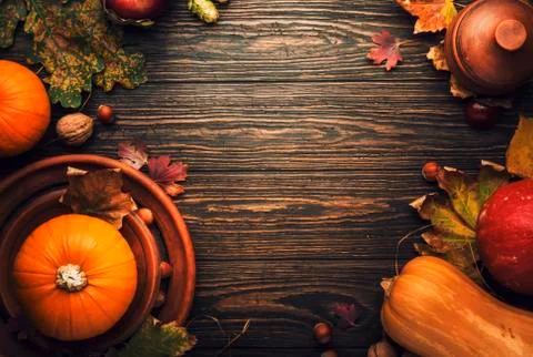 Thanksgiving dinner place setting. Autumn fruit, pumpkins, nuts, fallen leave Stock Photos