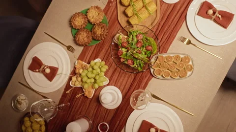 Thanksgiving Dinner Table Displaying Festive Dishes in Top down View Stock Footage 344851268