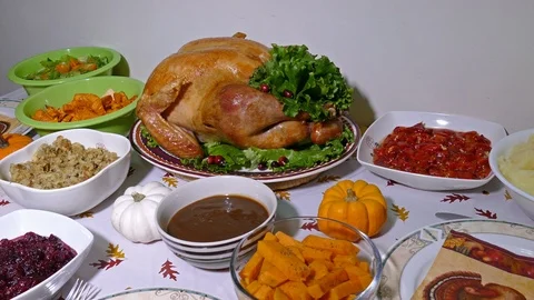 Thanksgiving dinner, turkey on dining table, Holiday meal with food Stock Footage