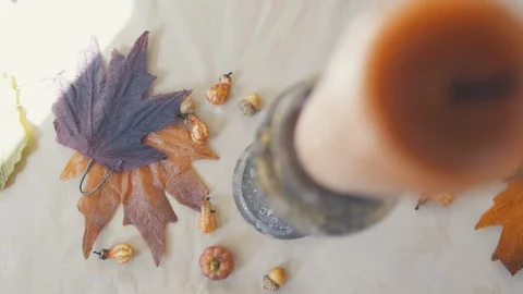 Thanksgiving fall table spread textures with acorns and leaves Stock Footage 117944070